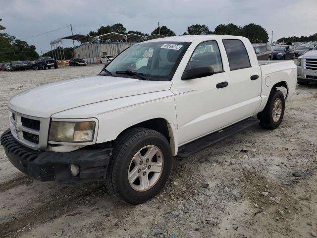DODGE DAKOTA SLT 2011 with VIN 1D7RE3GK4BS712526 - Photo from auction