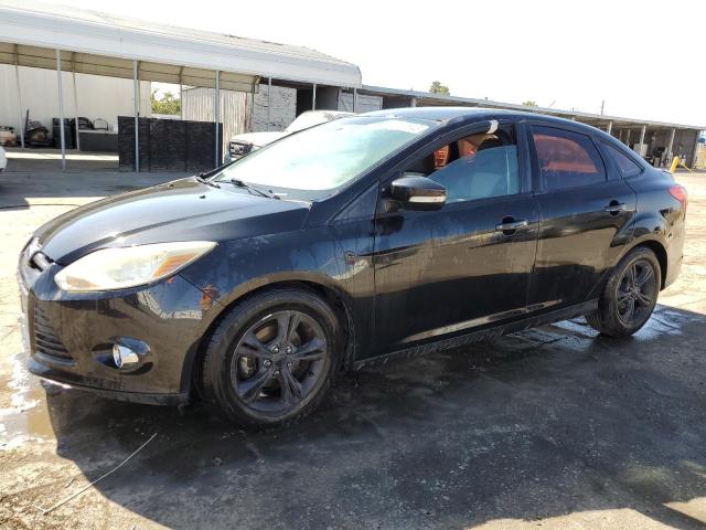 FORD FOCUS SE 2014 with VIN 1FADP3F27EL210176 - Photo from auction