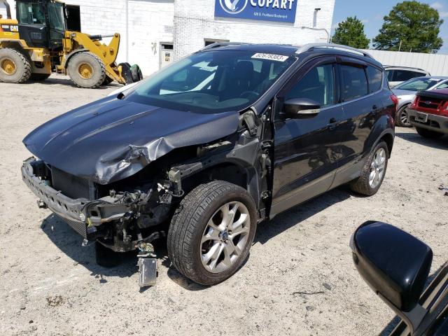 FORD ESCAPE TIT 2016 with VIN 1FMCU9JX3GUA01921 - Photo from auction
