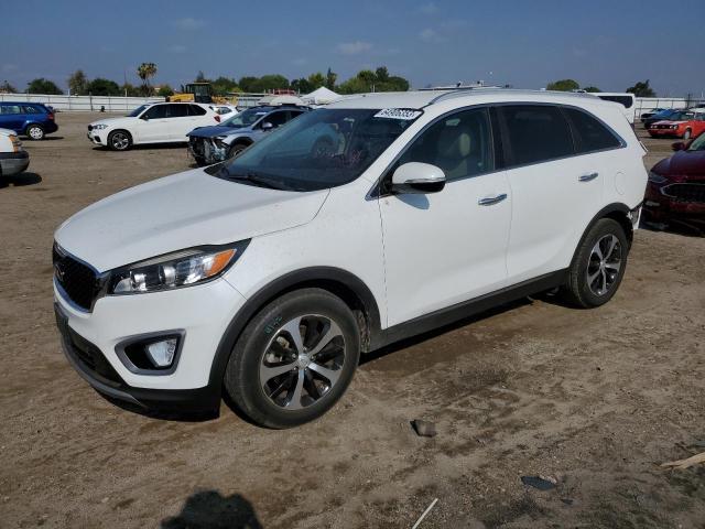KIA SORENTO EX 2016 with VIN 5XYPH4A50GG105750 - Photo from auction