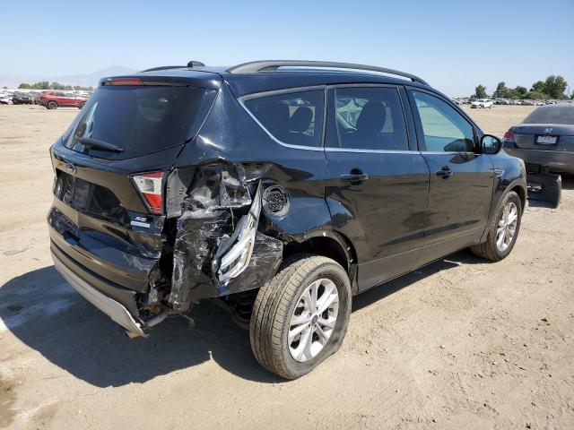 Photo 3 from auction – 2018 FORD ESCAPE SE with VIN 1FMCU0GD5JUB28301
