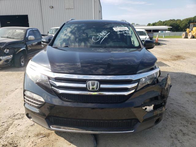 Photo 5 from auction – 2018 HONDA PILOT TOUR with VIN 5FNYF5H93JB003057