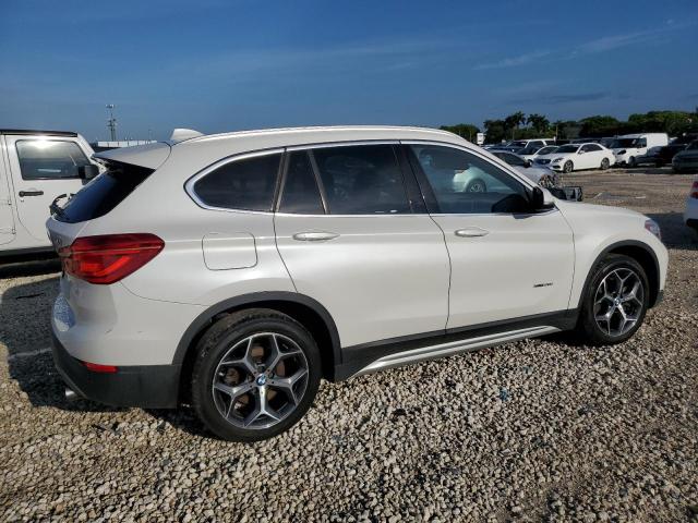 Photo 3 from auction – 2016 BMW X1 XDRIVE2 with VIN WBXHT3C36GP885570