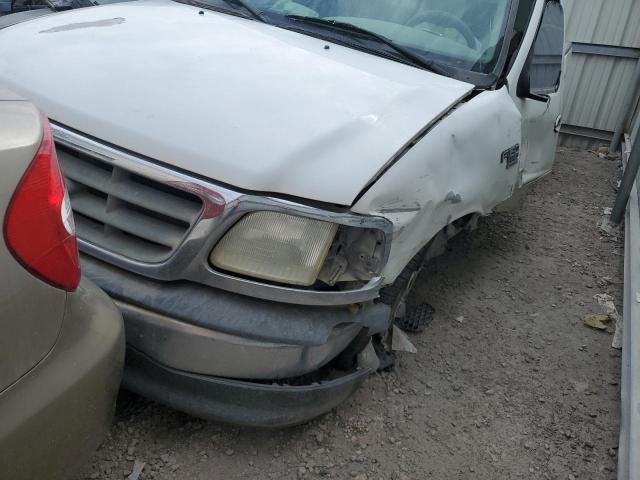 Foto 13 de la subasta – 2001 FORD F150 con VIN 1FTRX17L41NB09302