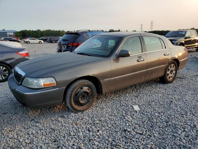 LINCOLN TOWN CAR E 2004 with VIN 1LNHM81W54Y656173 - Photo from auction