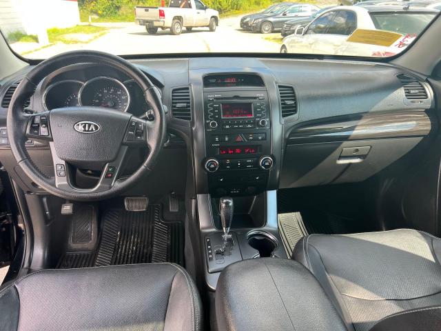 Photo 9 from auction – 2011 KIA SORENTO EX with VIN 5XYKUDA24BG052488