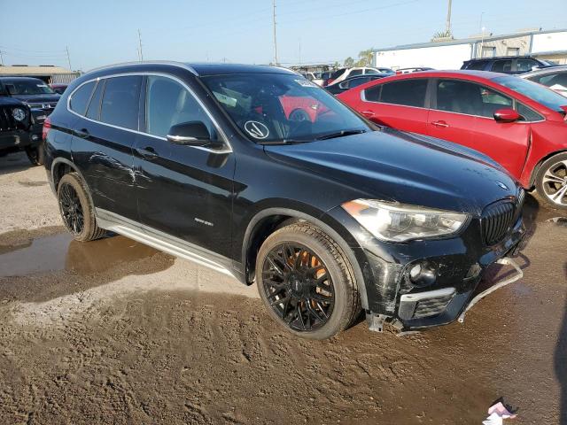 Photo 4 from auction – 2016 BMW X1 XDRIVE2 with VIN WBXHT3C3XG5E54261