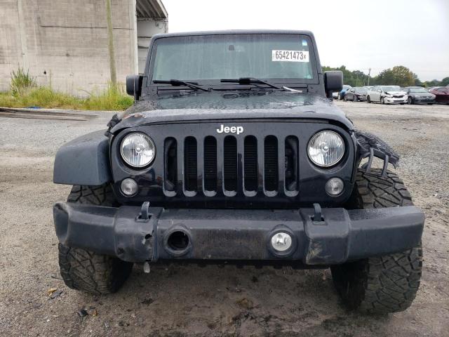 Photo 5 from auction – 2015 JEEP WRANGLER U with VIN 1C4BJWDG5FL688052