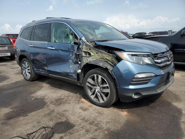 Photo 4 from auction – 2017 HONDA PILOT ELIT with VIN 5FNYF6H03HB079878