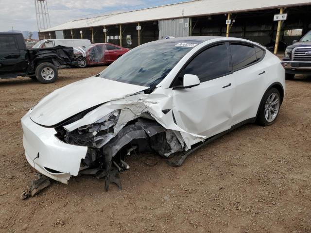 Снимка 1 от търг – 2023 TESLA MODEL Y с VIN 7SAYGDEE9PF644637