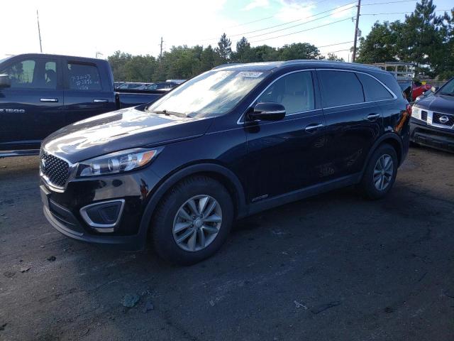 KIA SORENTO LX 2016 with VIN 5XYPGDA55GG028229 - Photo from auction
