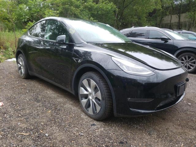 Photo 4 from auction – 2022 TESLA MODEL Y with VIN 7SAYGDEE2NF511893