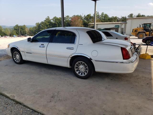 Photo 2 from auction – 2002 LINCOLN CONTINENTA with VIN 1LNHM82W22Y668521