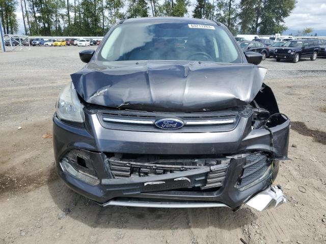 Photo 5 from auction – 2015 FORD ESCAPE SE with VIN 1FMCU9GXXFUC64106