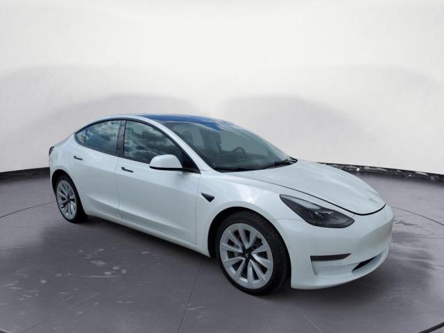 Photo 4 from auction – 2022 TESLA MODEL 3 with VIN 5YJ3E1EAXNF289063