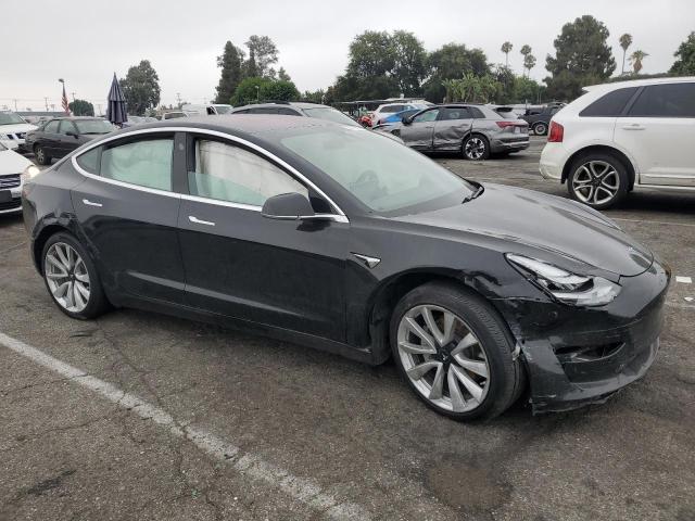 Photo 4 from auction – 2019 TESLA MODEL 3 with VIN 5YJ3E1EA6KF323737