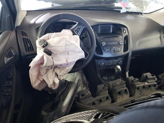 Photo 8 from auction – 2015 FORD FOCUS SE with VIN 1FADP3F22FL312857