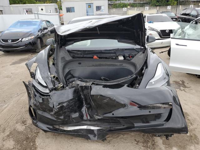 Photo 5 from auction – 2021 TESLA MODEL 3 with VIN 5YJ3E1EA5MF088315
