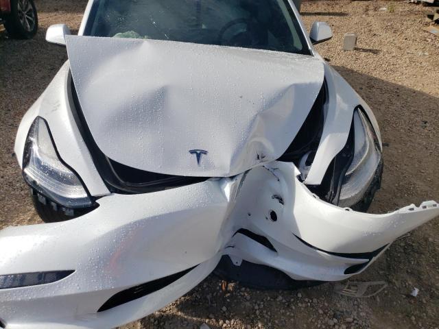 Photo 11 from auction – 2021 TESLA MODEL 3 with VIN 5YJ3E1EA9MF853431