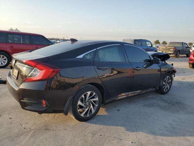 Photo 3 from auction – 2018 HONDA CIVIC EX with VIN 2HGFC2F70JH515404