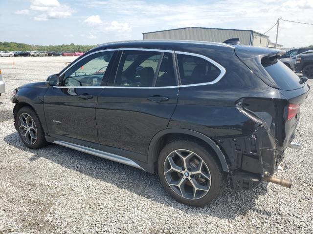 Photo 2 from auction – 2016 BMW X1 XDRIVE2 with VIN WBXHT3C33G5E50200
