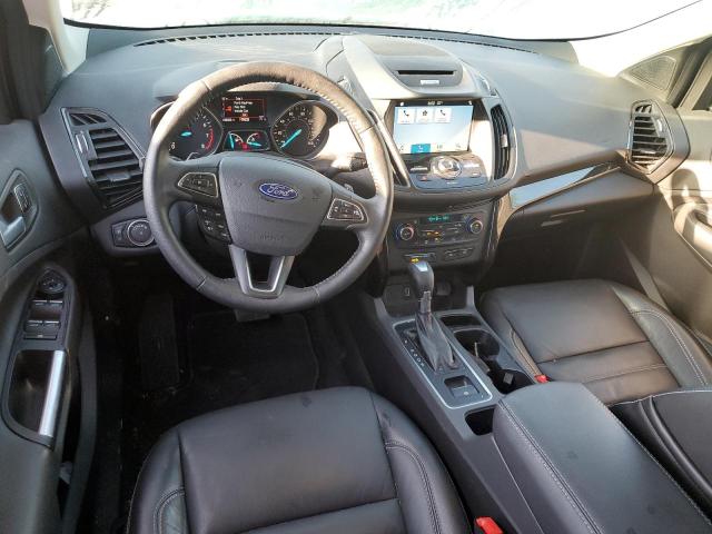 Photo 8 from auction – 2017 FORD ESCAPE TIT with VIN 1FMCU9J94HUF10435