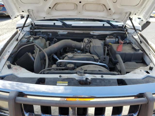 Photo 11 from auction – 2006 HUMMER H3 with VIN 5GTDN136168140859