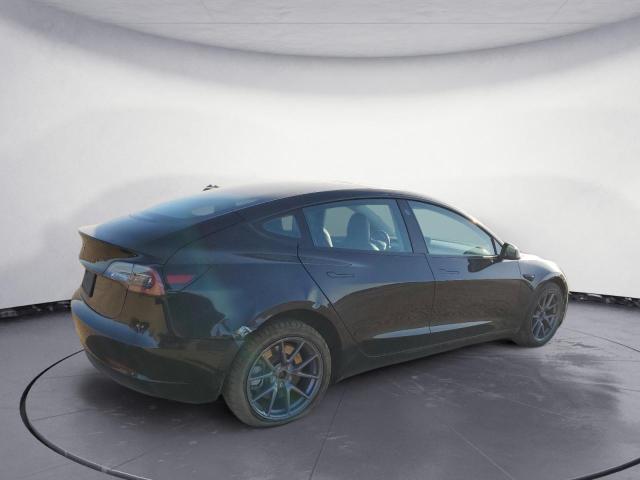 Photo 3 from auction – 2022 TESLA MODEL 3 with VIN 5YJ3E1EA3NF188852
