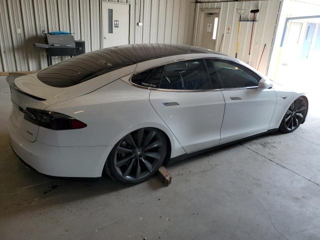 Снимка 3 от търг – 2014 TESLA MODEL S с VIN 5YJSA1H14EFP38272