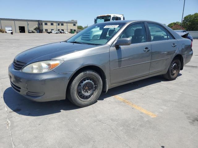 TOYOTA CAMRY LE 2004 with VIN 4T1BF32K84U577425 - Photo from auction