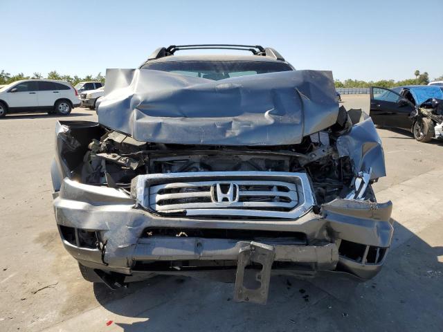 Photo 5 from auction – 2012 HONDA RIDGELINE with VIN 5FPYK1F44CB451667