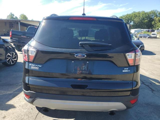 Photo 6 from auction – 2018 FORD ESCAPE SE with VIN 1FMCU9GD2JUA43811