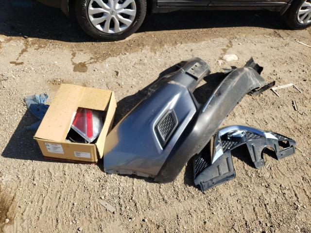 Photo 13 from auction – 2015 NISSAN ROGUE S with VIN 5N1AT2MK4FC765427