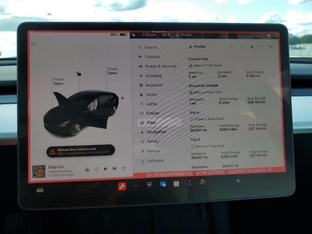 Photo 9 from auction – 2021 TESLA MODEL 3 with VIN 5YJ3E1EAXMF989700