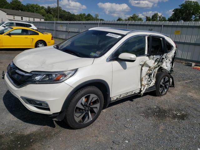 HONDA CR-V TOURI 2016 with VIN 5J6RM4H93GL014385 - Photo from auction