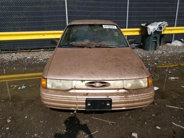 Photo 5 from auction – 1994 FORD ESCORT with VIN 3FARP13J0RR100342