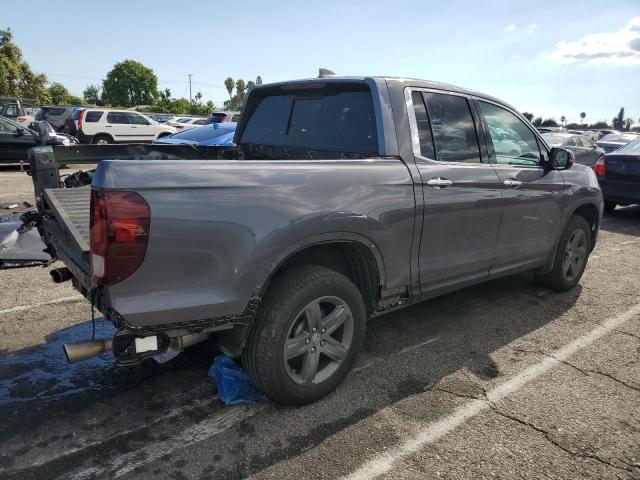 Photo 3 from auction – 2022 HONDA RIDGELINE with VIN 5FPYK3F74NB014163