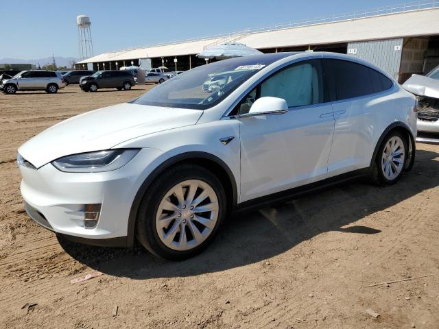 TESLA MODEL X 2018 with VIN 5YJXCBE24JF135528 - Photo from auction