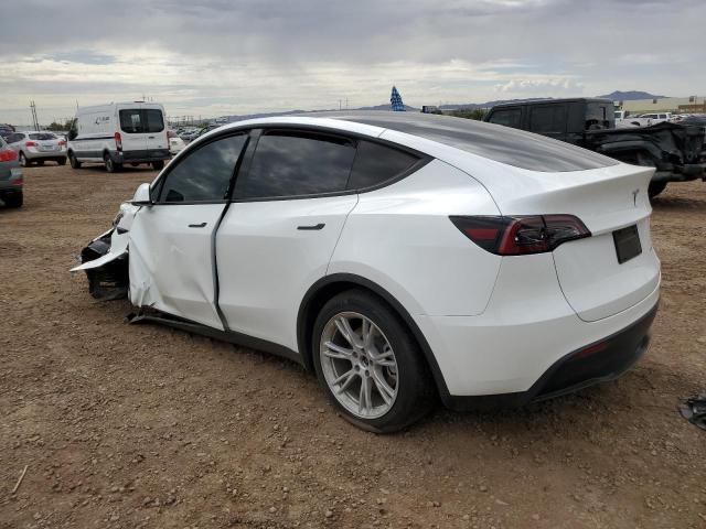 Снимка 2 от търг – 2023 TESLA MODEL Y с VIN 7SAYGDEE9PF644637