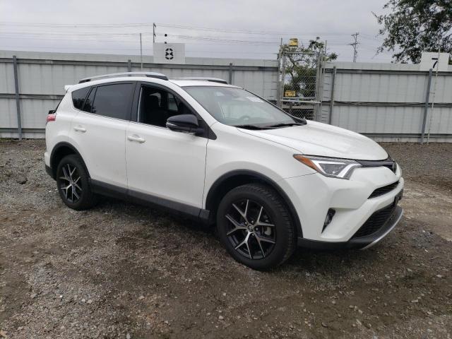 Photo 4 from auction – 2016 TOYOTA RAV4 SE with VIN JTMNFREV0GJ073130