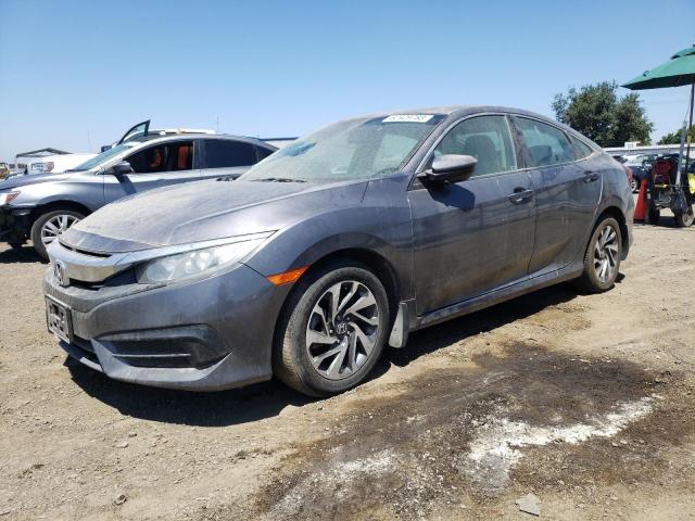 HONDA CIVIC EX 2017 with VIN 2HGFC2F76HH574810 - Photo from auction