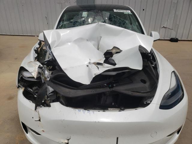 Photo 11 from auction – 2023 TESLA MODEL Y with VIN 7SAYGDEE1PF638461