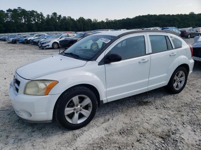 DODGE CALIBER 2011 with VIN 1B3CB3HA0BD215039 - Photo from auction