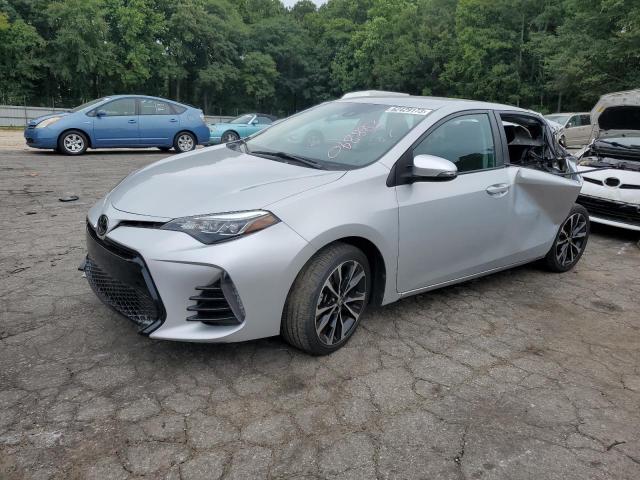 TOYOTA COROLLA L 2018 with VIN 2T1BURHE3JC068883 - Photo from auction