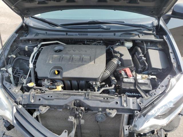 Photo 11 from auction – 2014 TOYOTA COROLLA L with VIN 2T1BURHE2EC008311