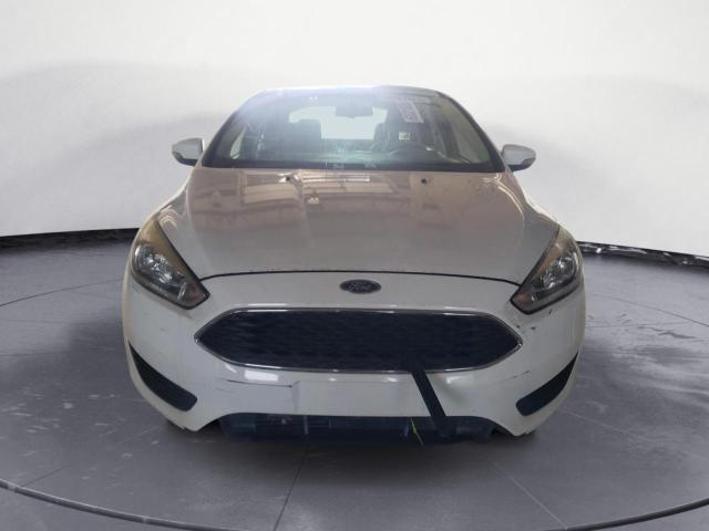 Photo 5 from auction – 2016 FORD FOCUS SE with VIN 1FADP3F27GL214019