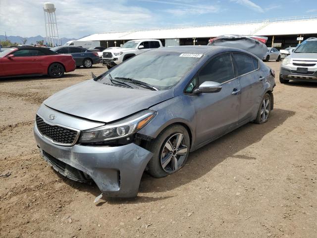 KIA FORTE LX 2018 with VIN 3KPFL4A71JE171045 - Photo from auction