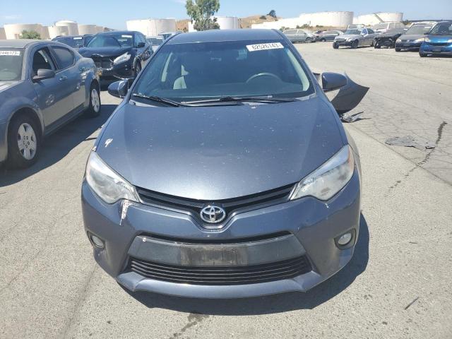Photo 5 from auction – 2014 TOYOTA COROLLA EC with VIN 2T1BPRHE0EC214461