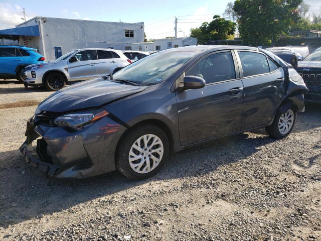 TOYOTA COROLLA L 2019 with VIN 5YFBURHE3KP894635 - Photo from auction