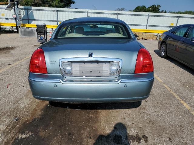 Photo 6 from auction – 2004 LINCOLN TOWN CAR E with VIN 1LNHM81W54Y631144